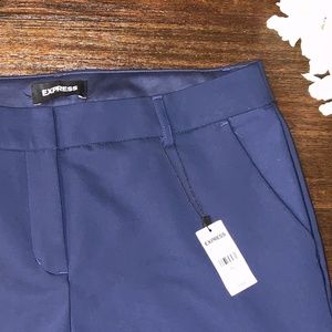 NWT. EXPRESS Columnist Barely Boot, Mid Rise. Stretch.10L Navy Blue